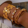 Bracelet jonc à perles blanches
