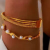 Bracelet jonc à perles blanches