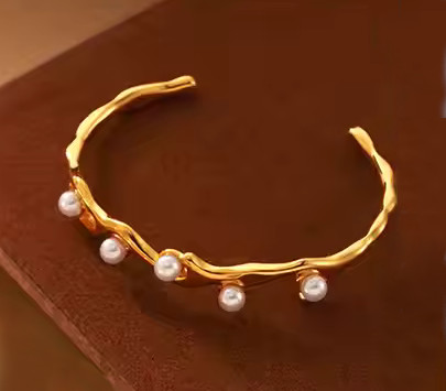 Bracelet jonc à perles blanches