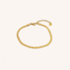 Superbe bracelet en acier plaqué or
