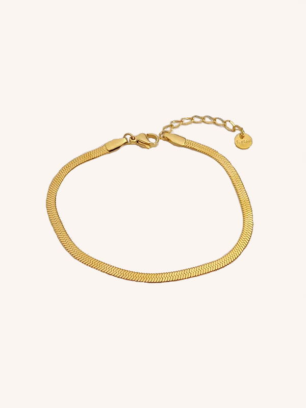 Superbe bracelet en acier plaqué or